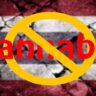 A digital graphic showing the word “Cannabis” crossed out with a yellow prohibition symbol over the Thai flag background, representing Thailand's cannabis ban.