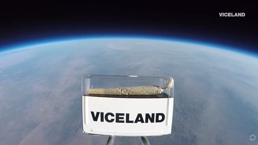 A sealed container holding a rolled joint floating near space with Earth visible below, part of a promotional high-altitude experiment by Viceland.