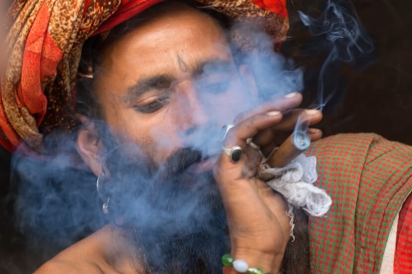 Indian Hindu Sadhu smoking marijuana