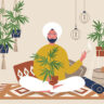 Young Indian man smoking weed indoors