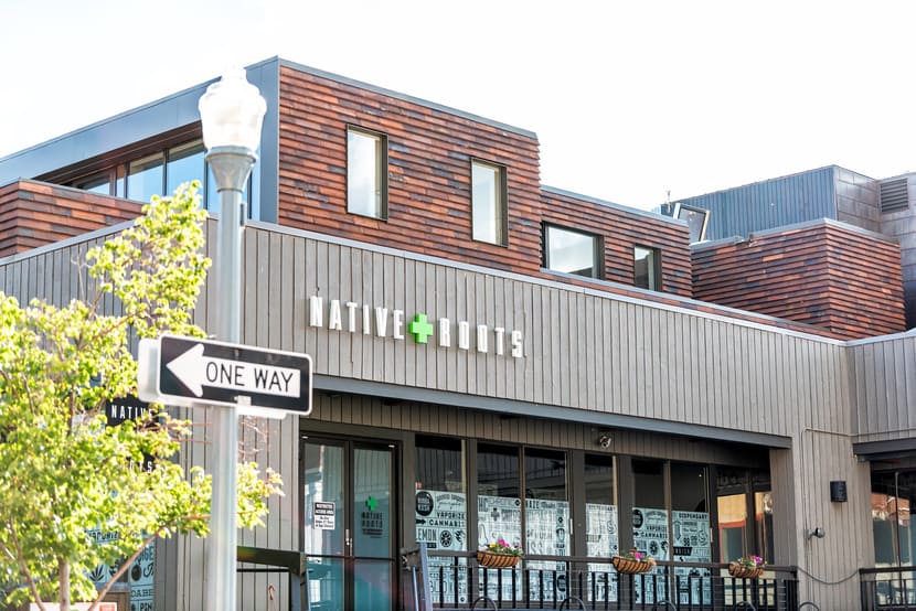 An exterior view of Native Roots dispensary in Aspen Colorado on a sunny morning