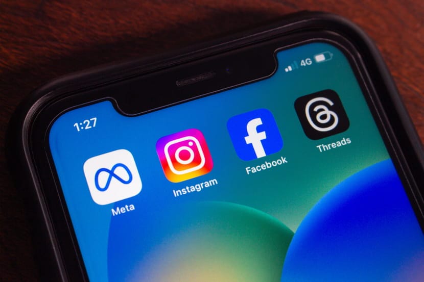 Meta, Instagram, Facebook, and Threads apps displayed on a smartphone.